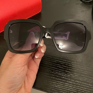 Guess glasses with red case still has a tag